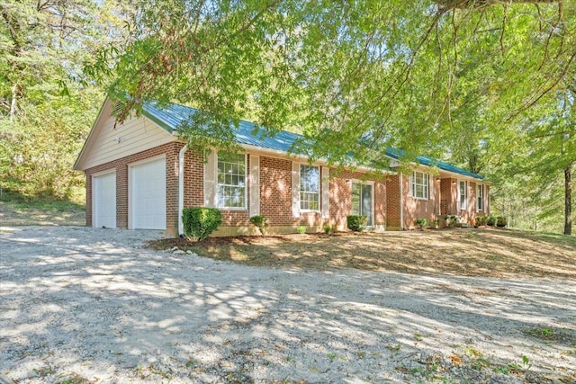 ranch-style home with a garage