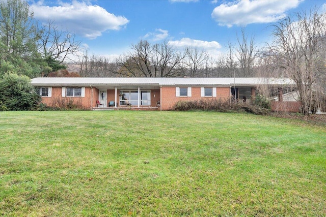 ranch-style home with a front yard