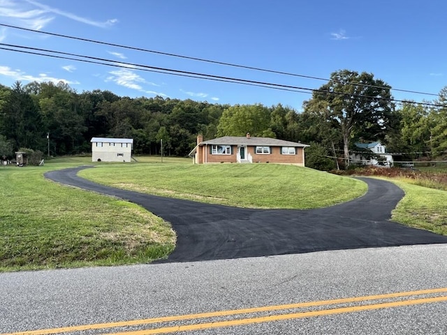 view of front of home with a front lawn