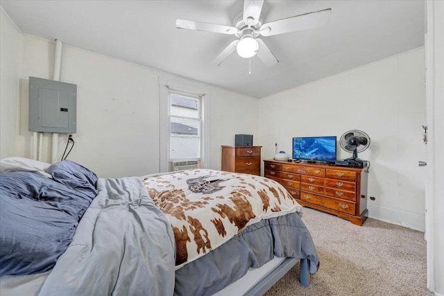 carpeted bedroom featuring ceiling fan and electric panel