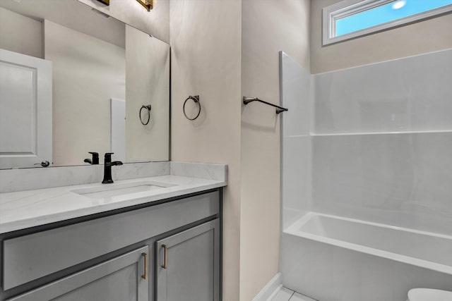 bathroom with shower / bathtub combination and vanity