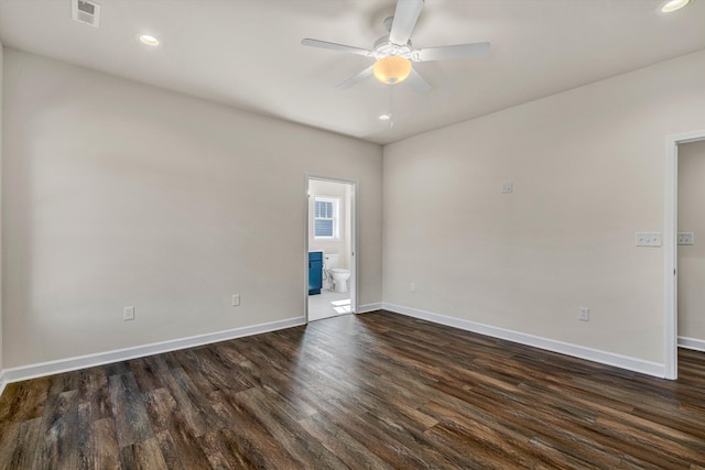 spare room with dark wood-style flooring, recessed lighting, visible vents, ceiling fan, and baseboards