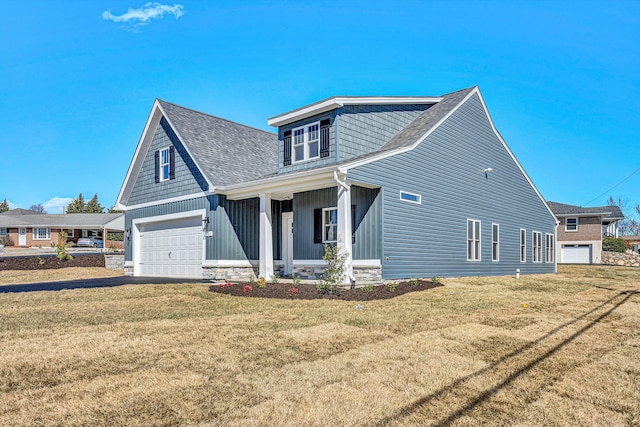 view of front facade with a garage, a front lawn, board and batten siding, and a shingled roof