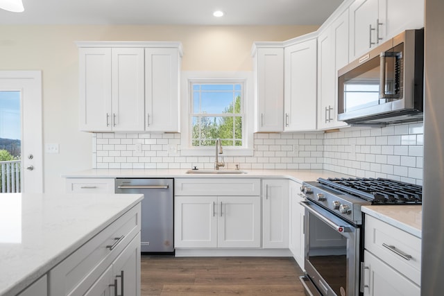 6913 Doral Dr, Radford, VA 24141 - kitchen featuring recessed lighting, white cabinets, stainless steel appliances, and a sink