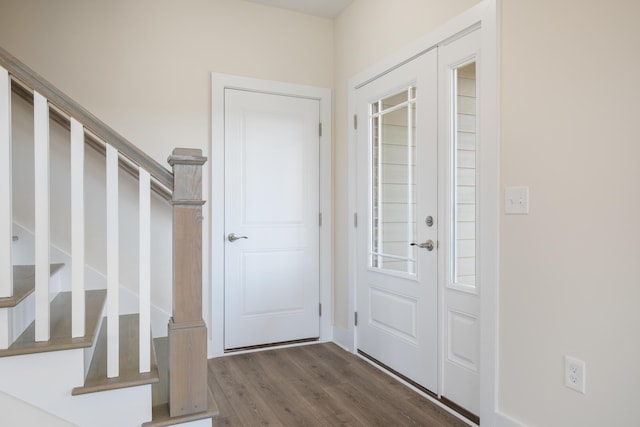 6913 Doral Dr, Radford, VA 24141 - entrance foyer with stairway and dark wood finished floors