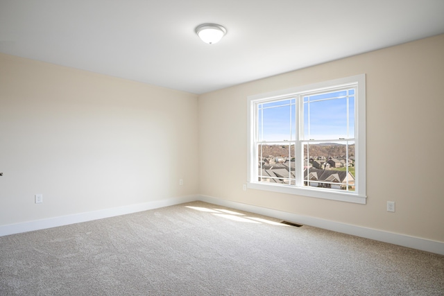 6903 Doral Dr, Radford, VA 24141 - carpeted empty room with baseboards and visible vents