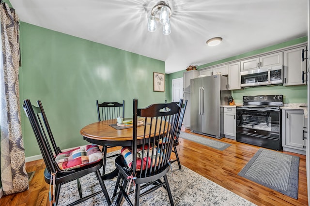 dining room featuring light hardwood / wood-style flooring