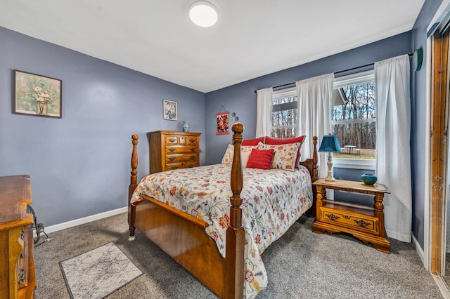 bedroom with dark colored carpet