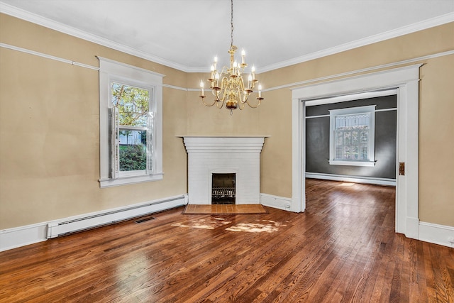 unfurnished living room with dark hardwood / wood-style floors, baseboard heating, ornamental molding, a notable chandelier, and a brick fireplace