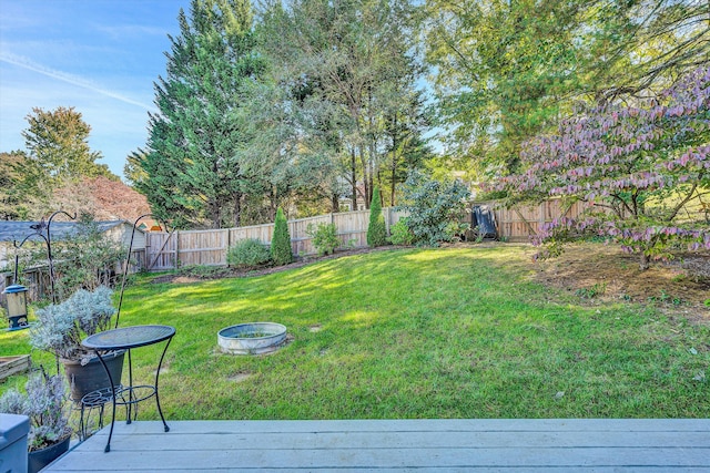 view of yard featuring a wooden deck