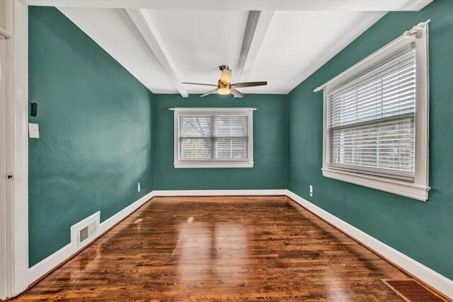 6869 Old Mill Rd, Roanoke, VA 24018 - unfurnished room featuring wood finished floors, a ceiling fan, beam ceiling, and visible vents