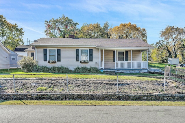 ranch-style home with a porch