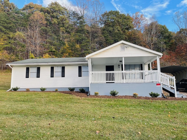 view of front facade featuring covered porch and a front yard