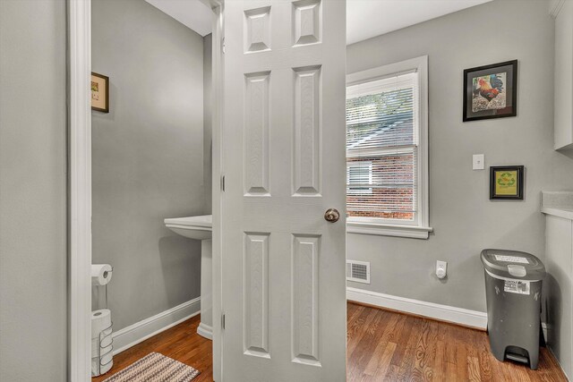 bathroom featuring hardwood / wood-style flooring