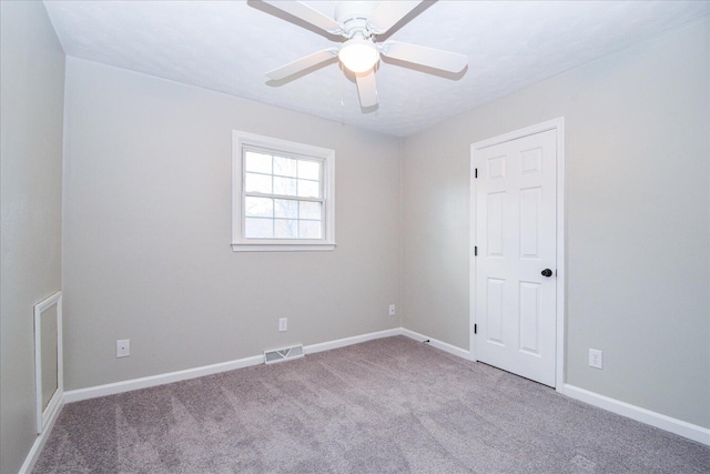 unfurnished room with light carpet and ceiling fan