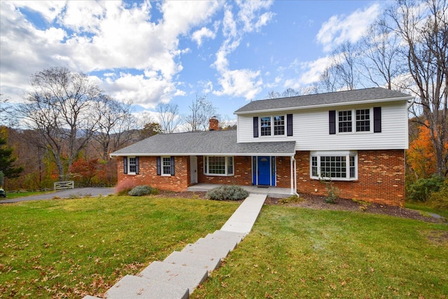 view of front property with a front lawn