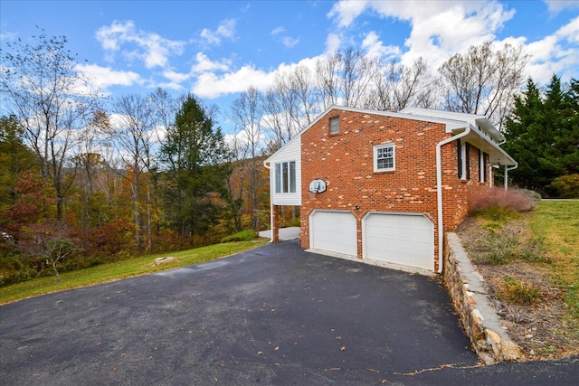 view of home's exterior featuring a garage