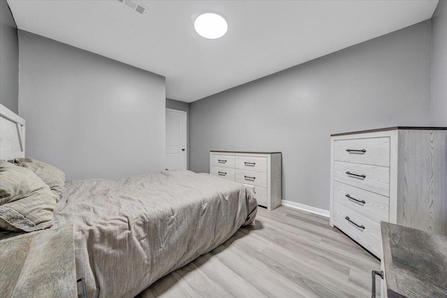 bedroom featuring light hardwood / wood-style flooring