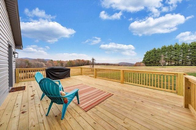 wooden deck with area for grilling