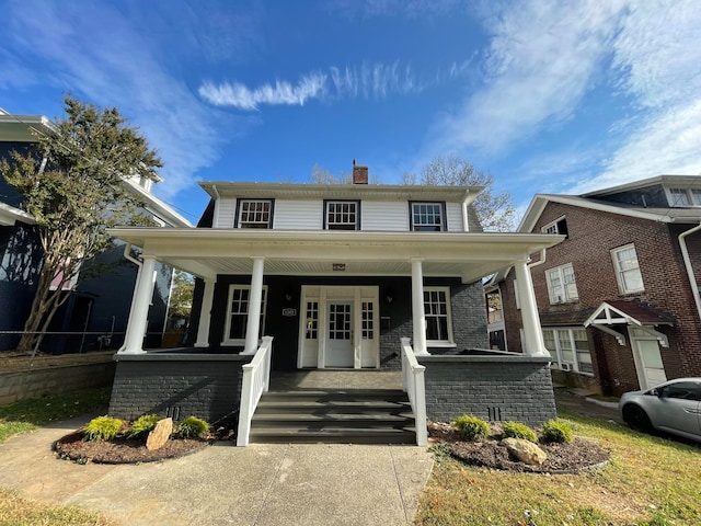 front facade featuring covered porch