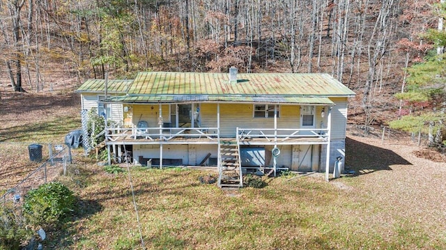7820 Ogle Creek Rd, Covington, VA 24426 - back of property with stairs and metal roof