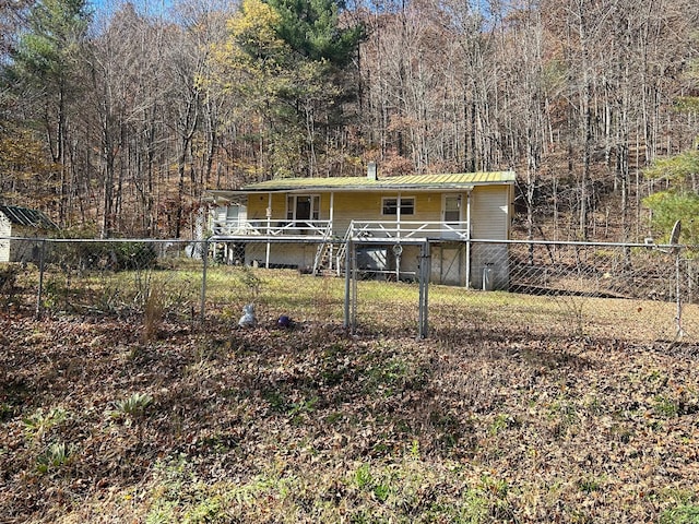 7820 Ogle Creek Rd, Covington, VA 24426 - view of front facade featuring metal roof and a view of trees