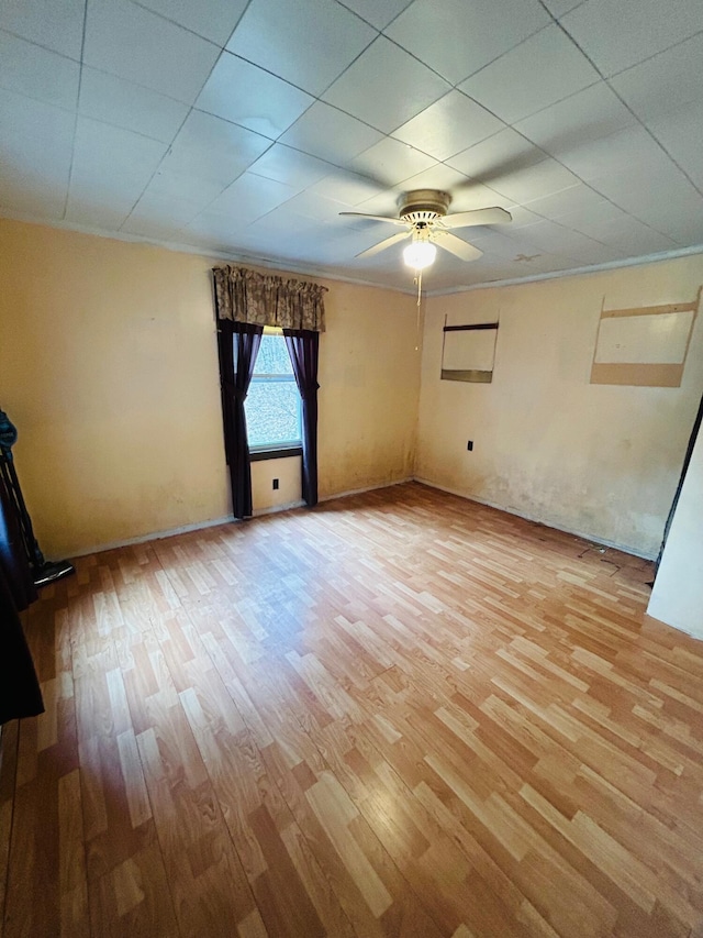 7820 Ogle Creek Rd, Covington, VA 24426 - empty room with light wood finished floors, ceiling fan, and ornamental molding