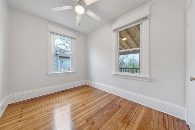1132 Montrose Ave SE, Roanoke, VA 24013 - unfurnished room with light wood finished floors, baseboards, and a ceiling fan