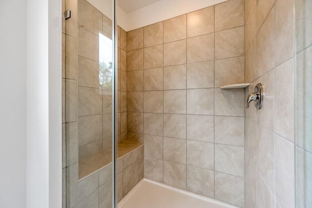 bathroom featuring an enclosed shower