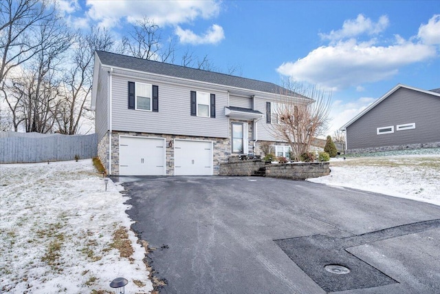 raised ranch with a garage