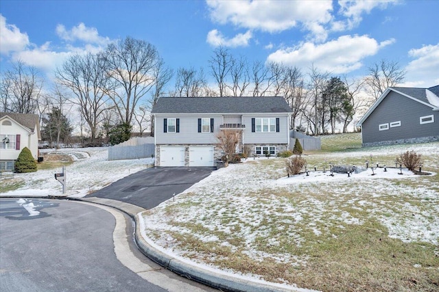 raised ranch with a garage