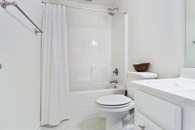 full bathroom featuring vanity, shower / bath combo with shower curtain, and toilet