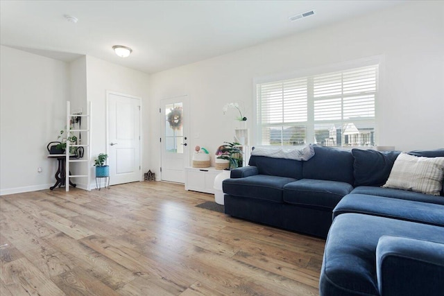 living room with light wood-type flooring