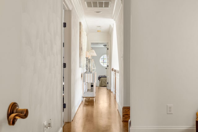 hallway with light wood-type flooring