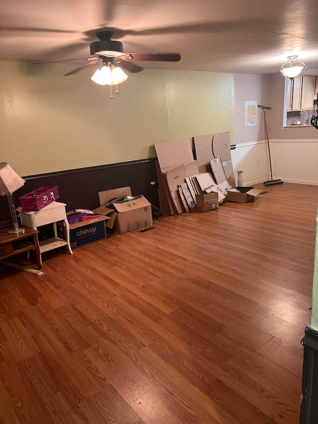 recreation room featuring wood-type flooring and ceiling fan