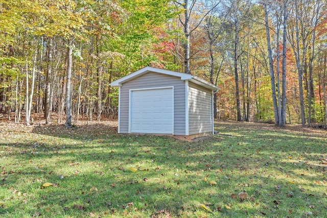 garage featuring a yard