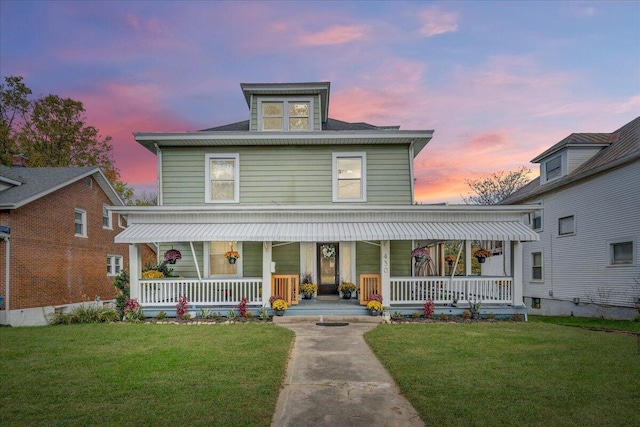 view of front of home featuring a yard