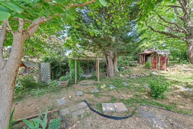 view of yard with fence