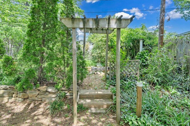 view of yard with fence