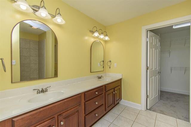 bathroom with vanity and tile patterned floors