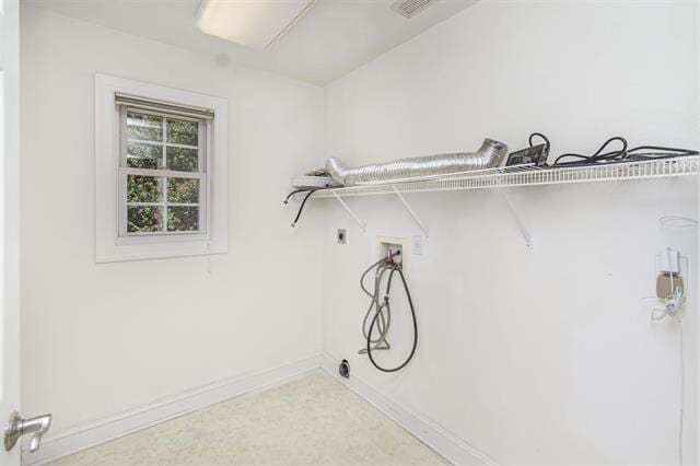 washroom featuring hookup for a washing machine, carpet flooring, and electric dryer hookup