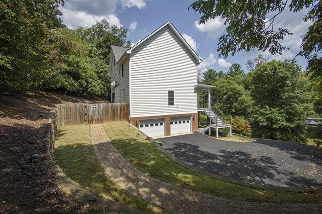 view of property exterior featuring a garage