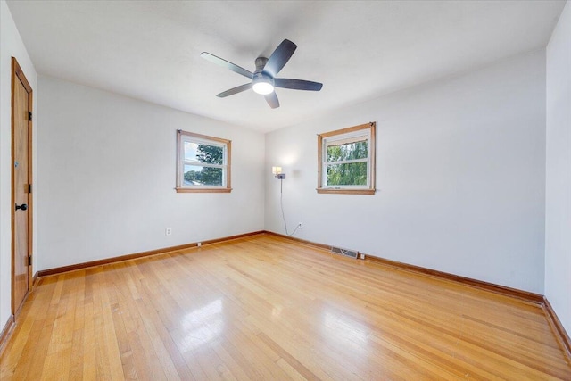 2422 Kingston Rd NW, Roanoke, VA 24017 - spare room featuring light wood finished floors and a ceiling fan
