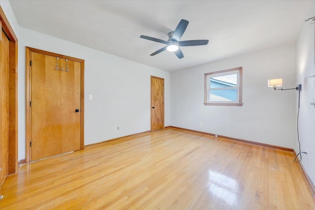 2422 Kingston Rd NW, Roanoke, VA 24017 - unfurnished bedroom featuring light wood-style floors and ceiling fan