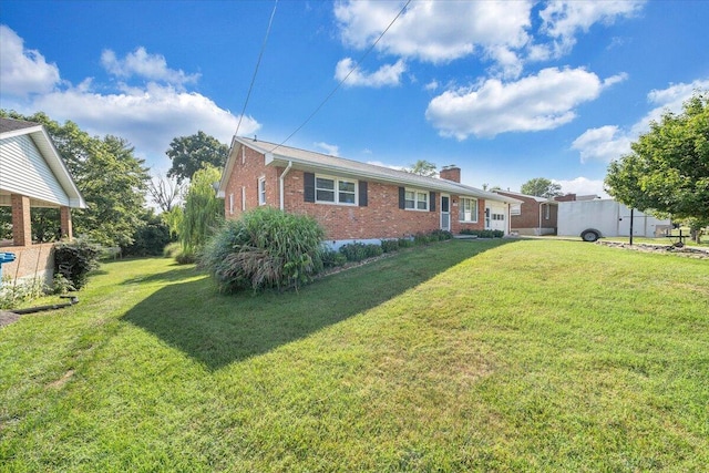 2422 Kingston Rd NW, Roanoke, VA 24017 - back of house with brick siding, a yard, and a chimney