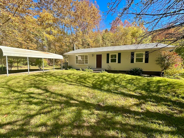 single story home with a front yard and a carport