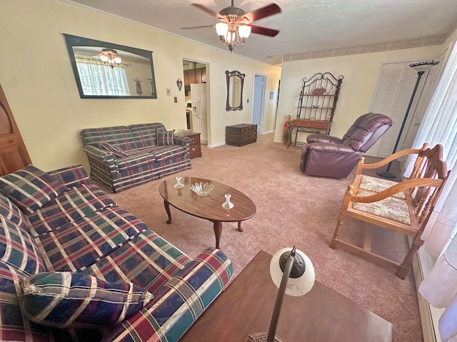 carpeted living room with ceiling fan