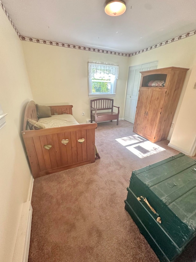 bedroom featuring carpet