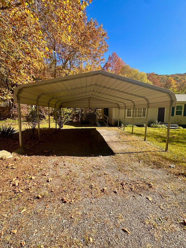 view of parking featuring a carport