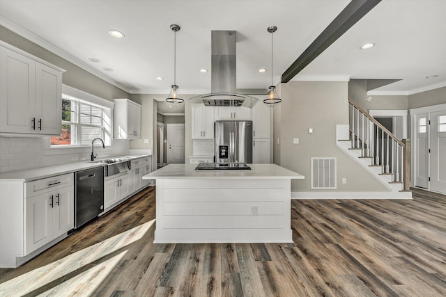 1154 Barrow Hills Dr, Huddleston, VA 24104 - kitchen with stainless steel appliances, island exhaust hood, ornamental molding, a sink, and tasteful backsplash
